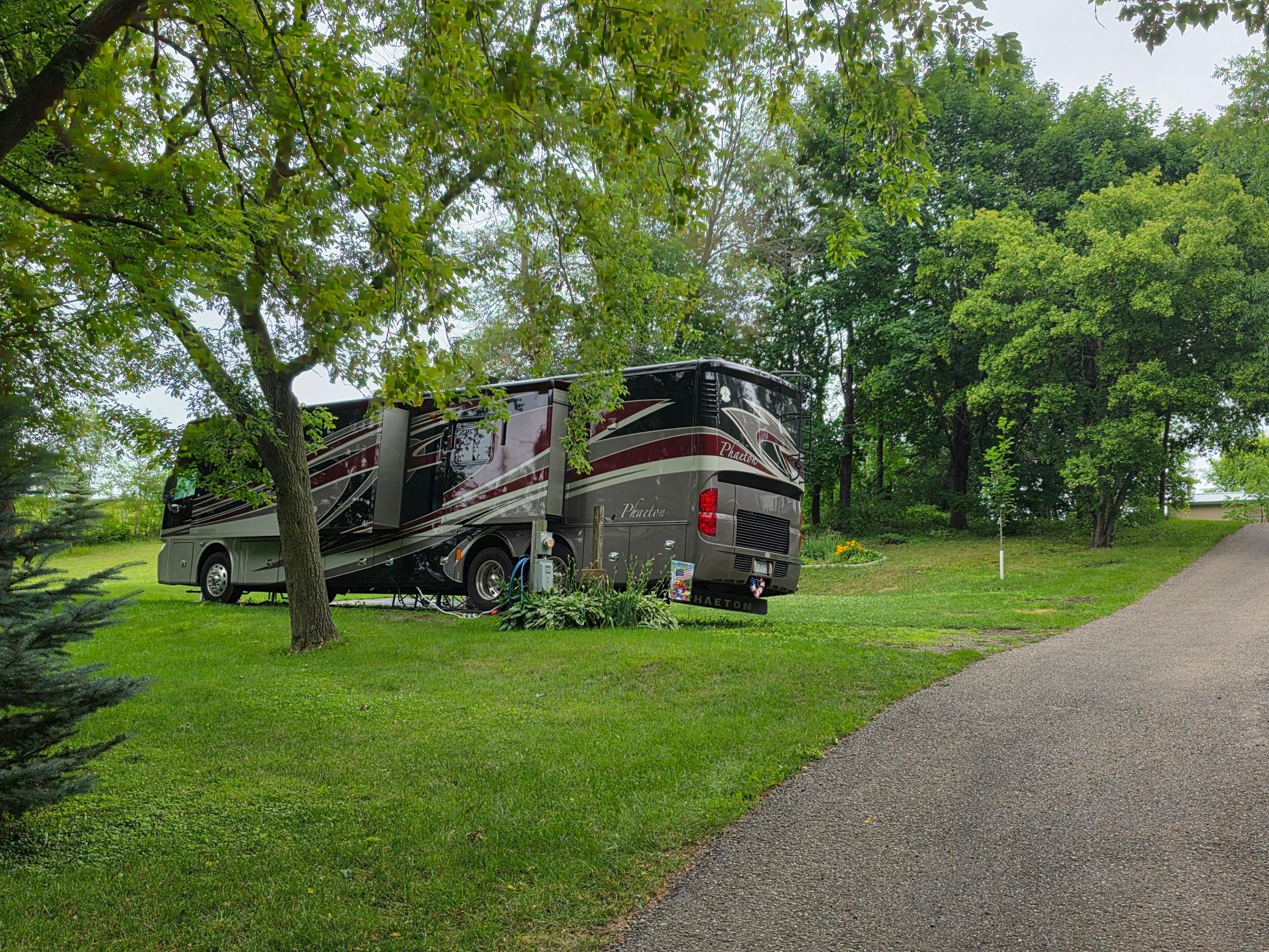 Unit 234 has a great pad for heavy RV, then includes all the way up the hill in the trees
