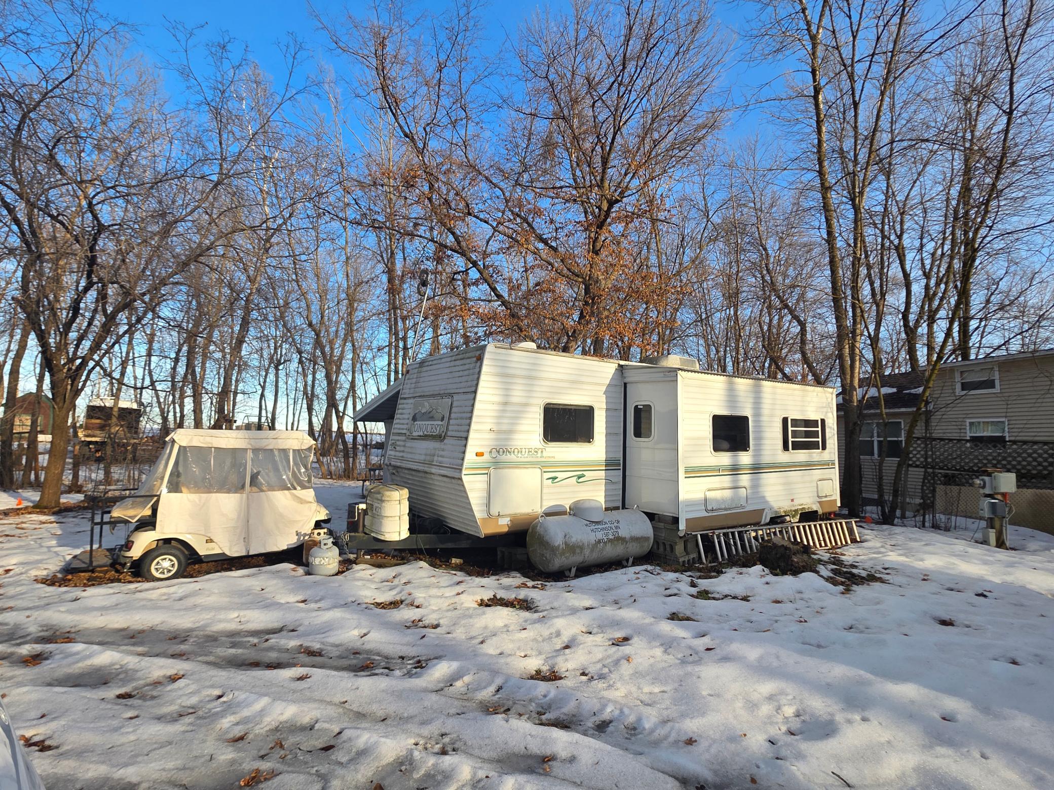 Back side of Unit 433. RV can be included or removed at time of sale.