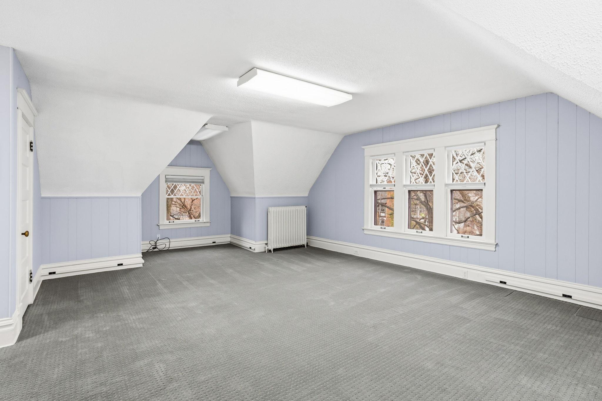 Spacious 3rd floor family room can also be a great home office