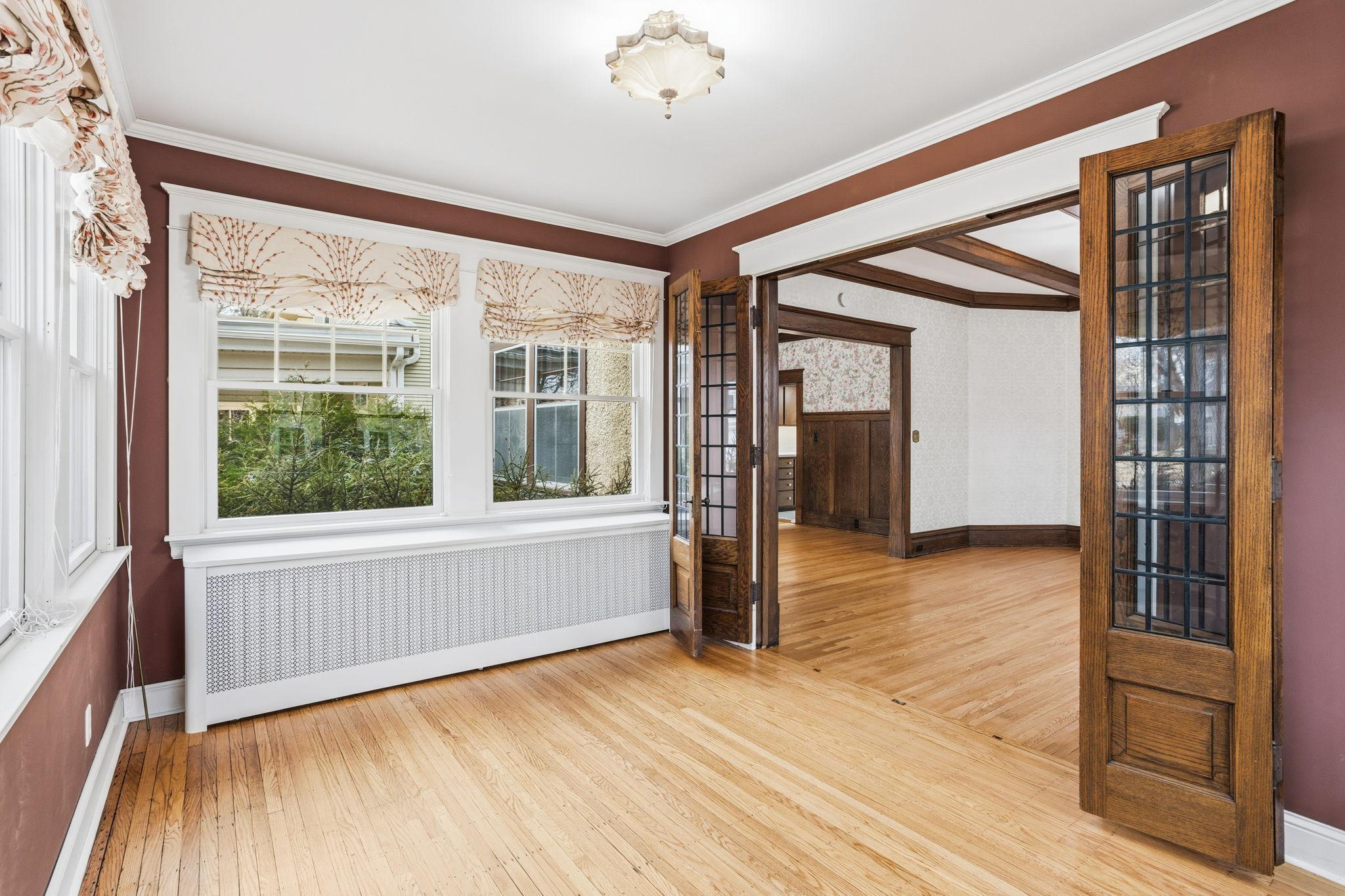 Beautiful doors between sunroom and living room