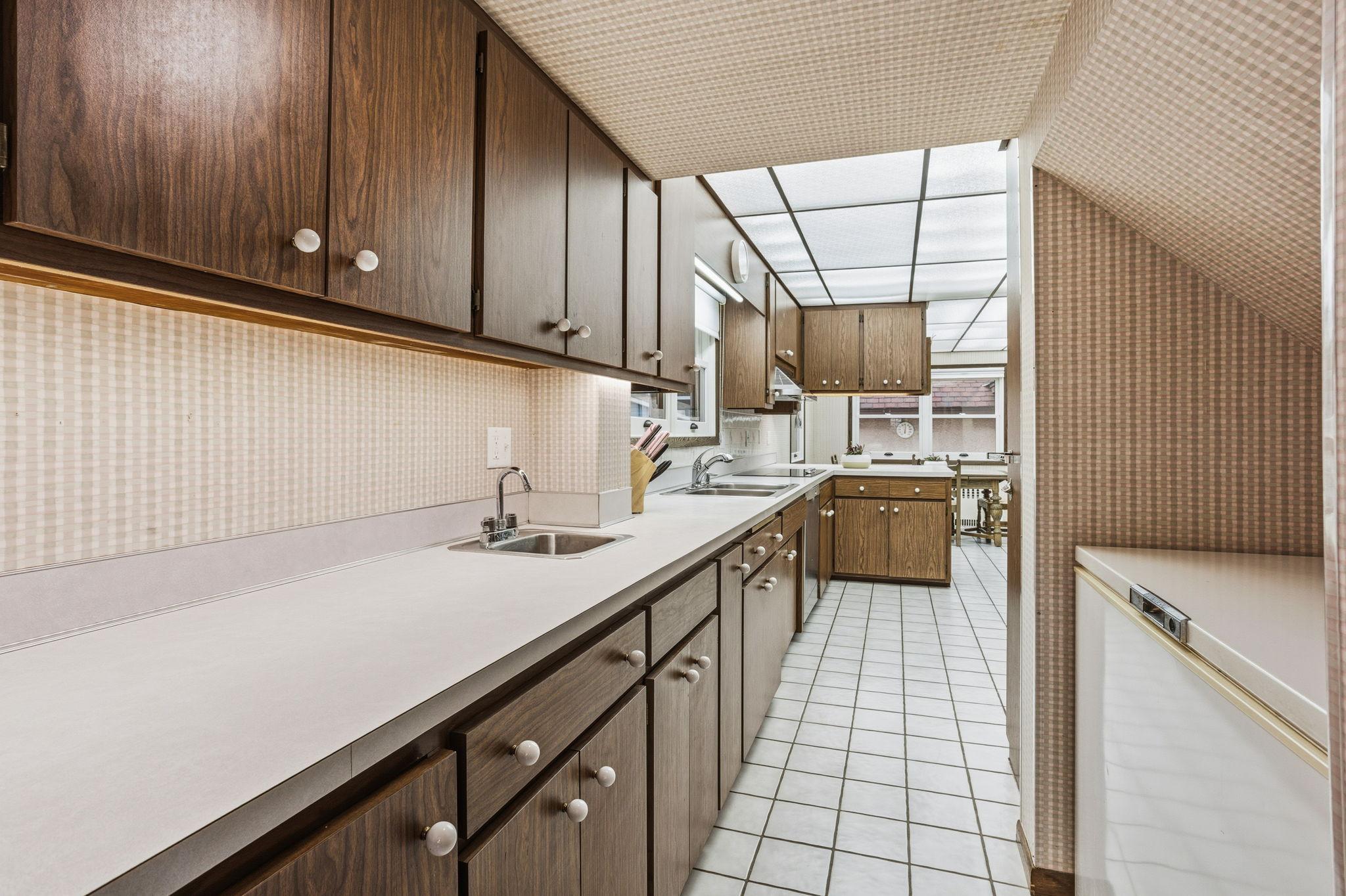 Large, galley kitchen with butler's pantry