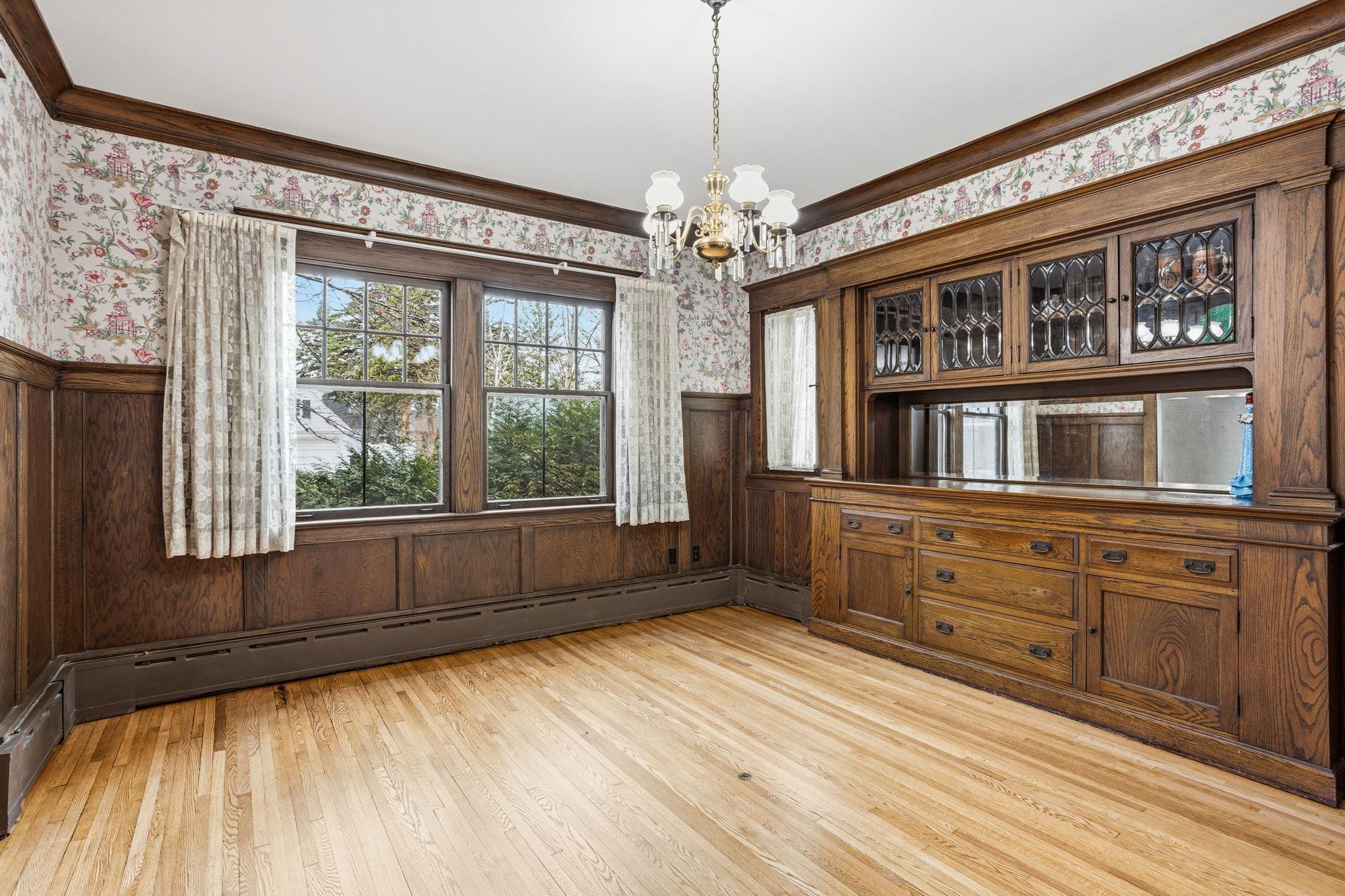 Spacious, formal dining room with buffet