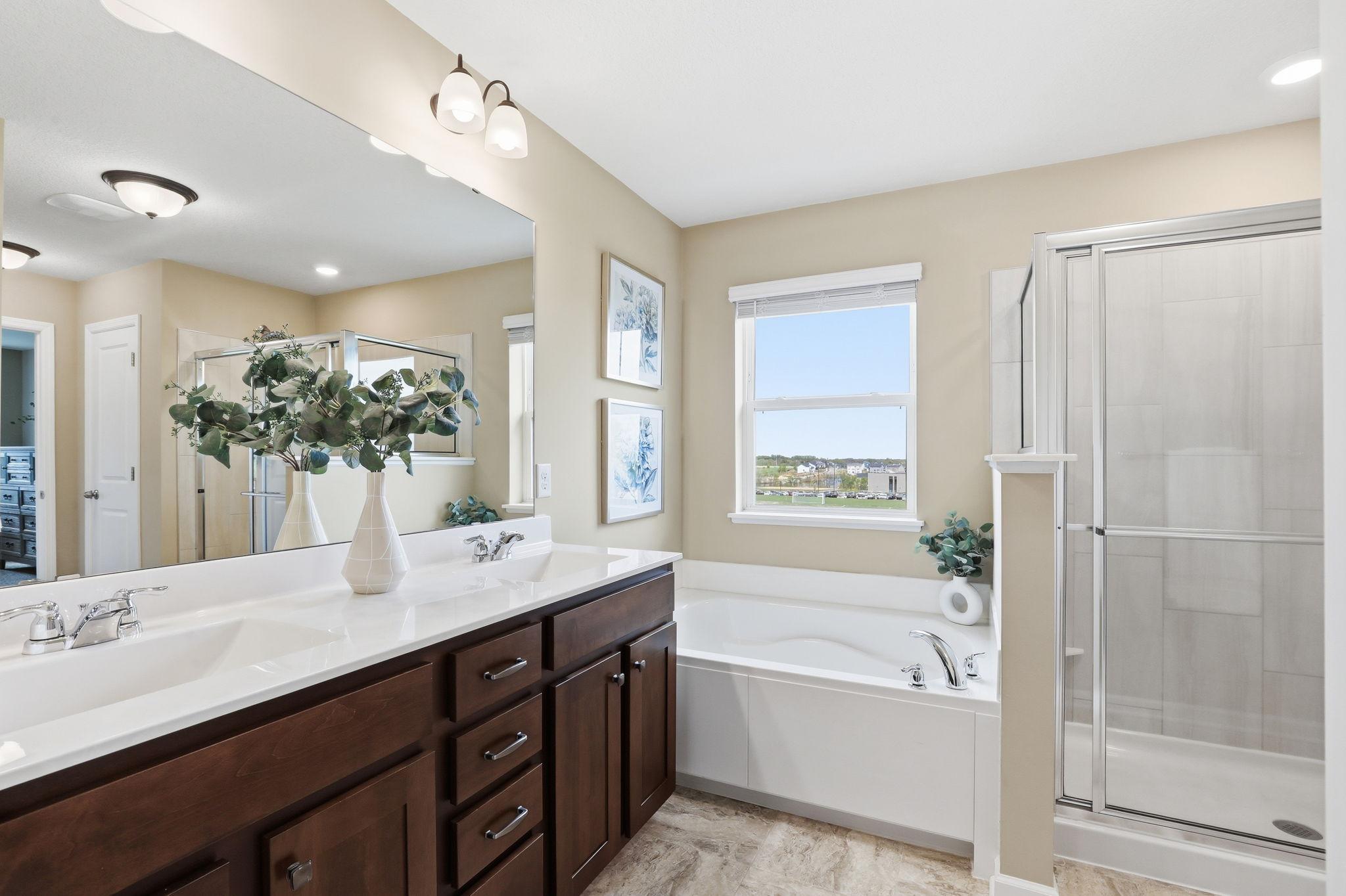 Separate tub and walk-in shower, creates a comfortable and spa-like retreat.