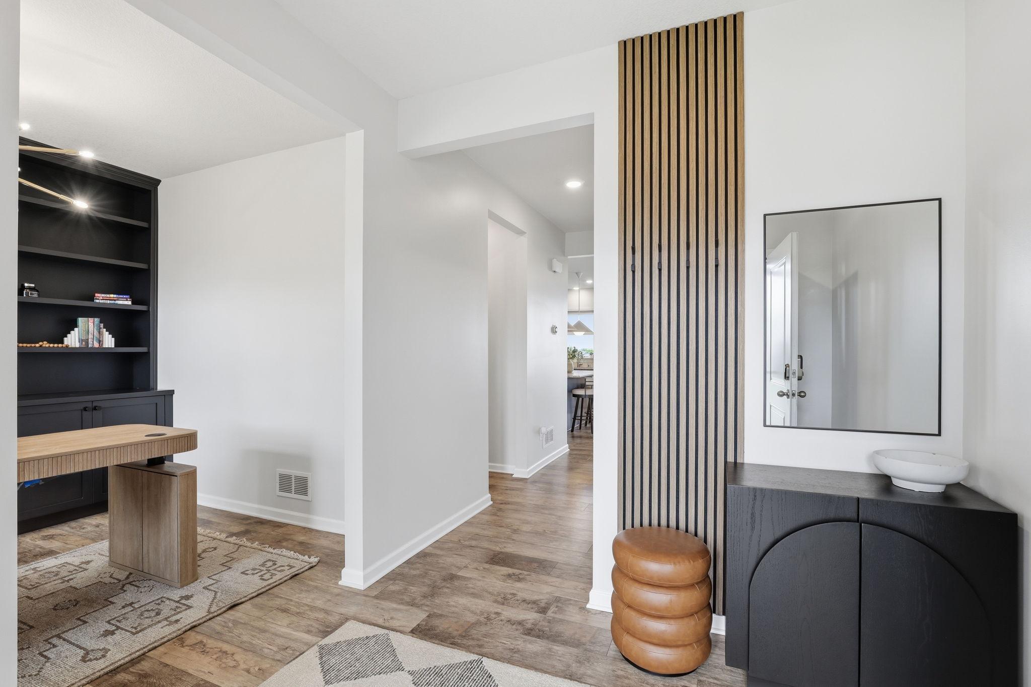 New LVP flooring (2024) throughout the main level adds stylish, durable, low-maintenance appeal.