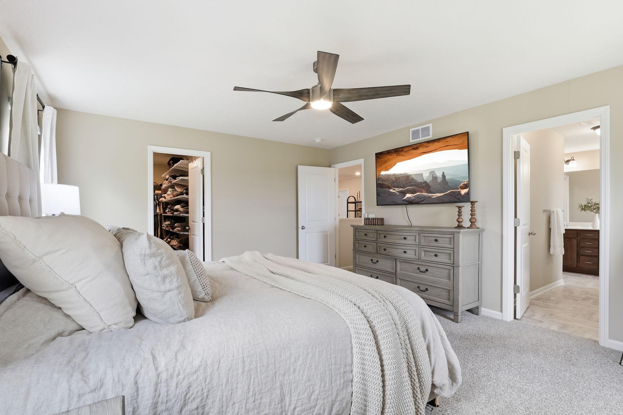 Primary suite complete with a private ensuite bathroom and a walk-in closet for added convenience and storage.