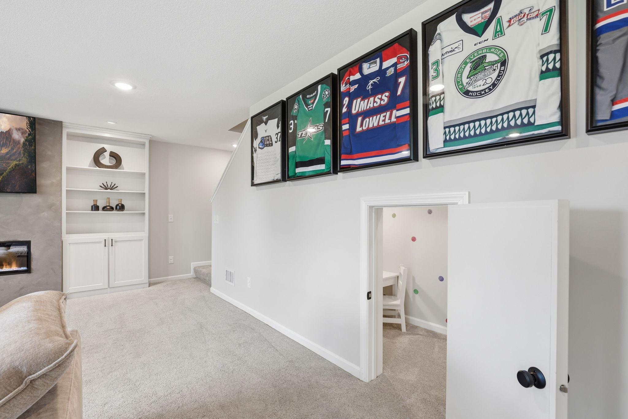 Under-stair playroom is a hidden gem space, perfect for imaginative play or cozy storage tucked conveniently out of sight.