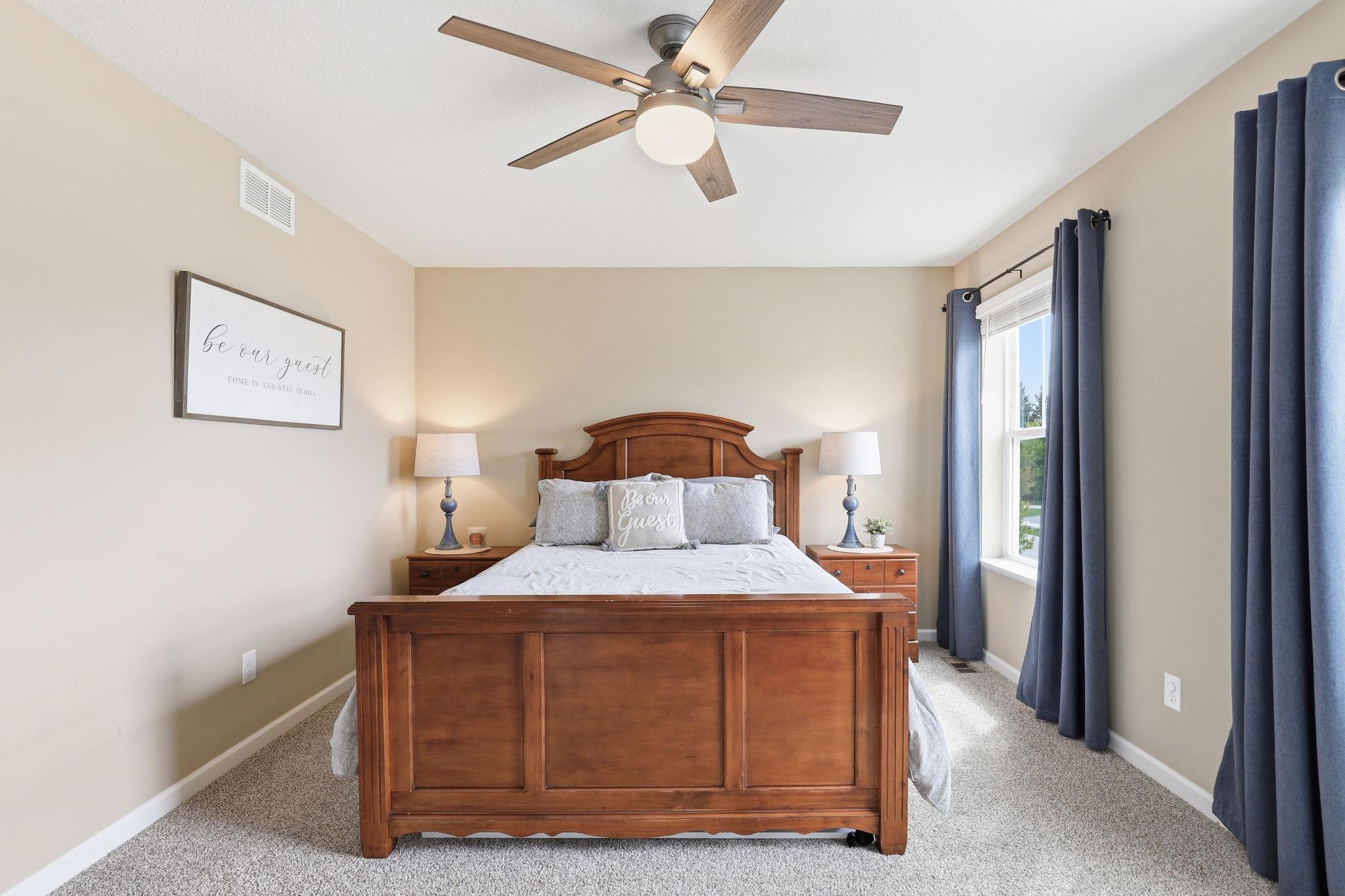 First of the three additional upper-level bedrooms, all generously sized, offering comfortable spaces with great natural light and flexible use options.