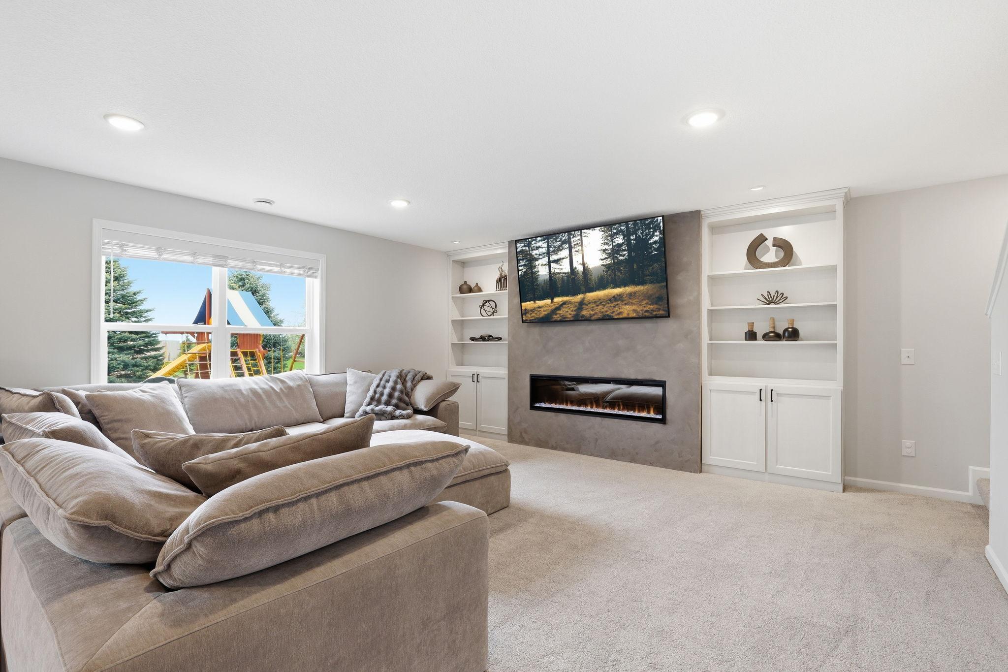 Electric fireplace with built-ins adds a warm and inviting feature, combining storage, style, and modern comfort.