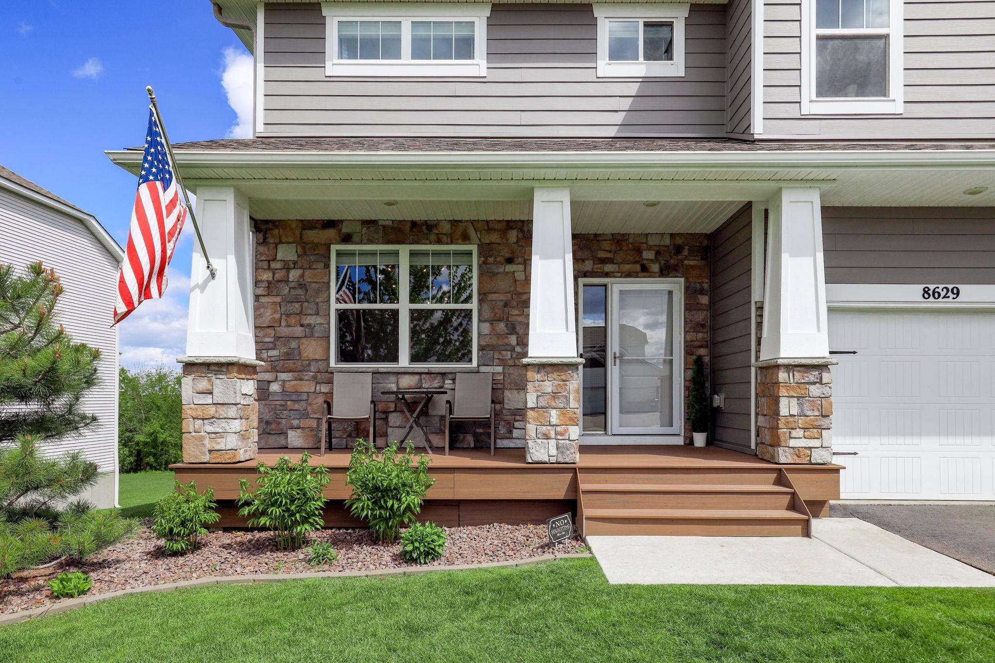 New maintenance-free porch (2024) offering durable, low-upkeep outdoor living space.