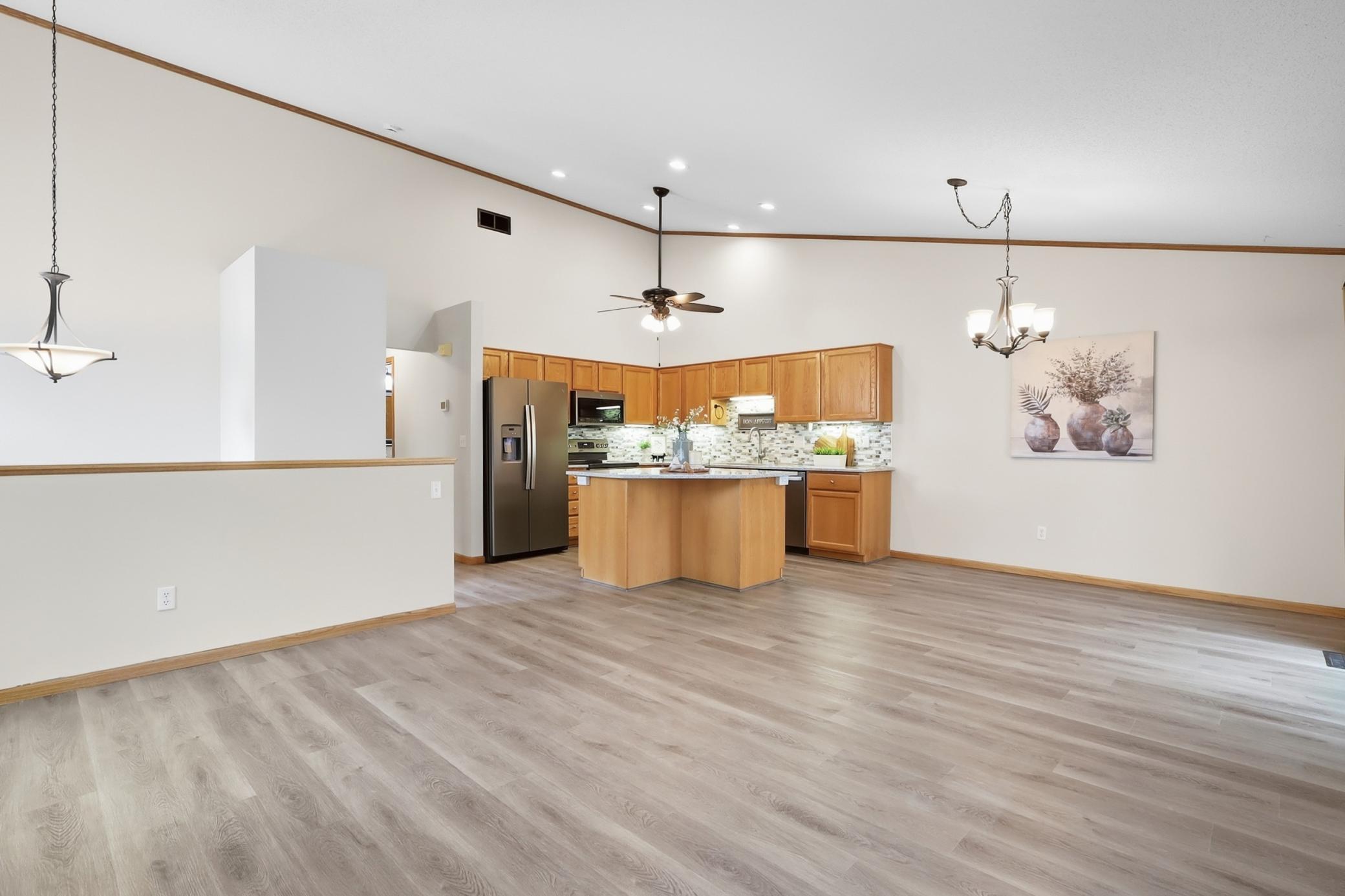 Gorgeous new LVP (luxury vinyl plank) flooring and fresh paint throughout this home make it a stand out!