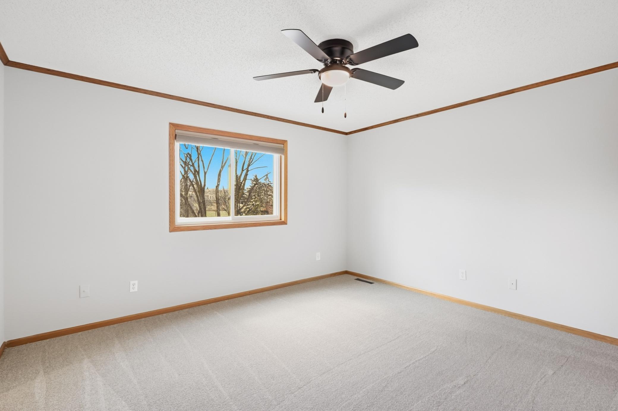 Primary Bedroom shines with space, fresh paint and carpet.