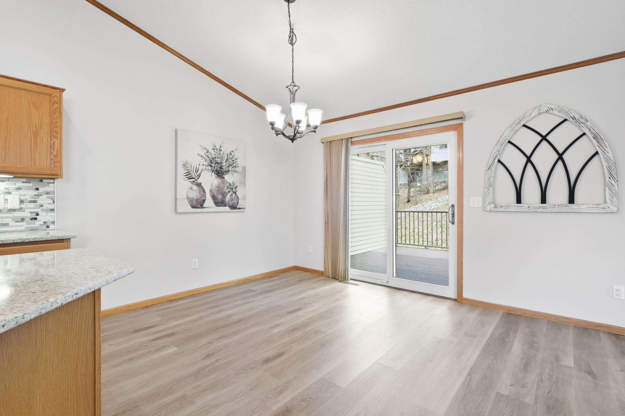 Dining area offers plenty of room for your entertaining and opens to the outdoor living spaces.