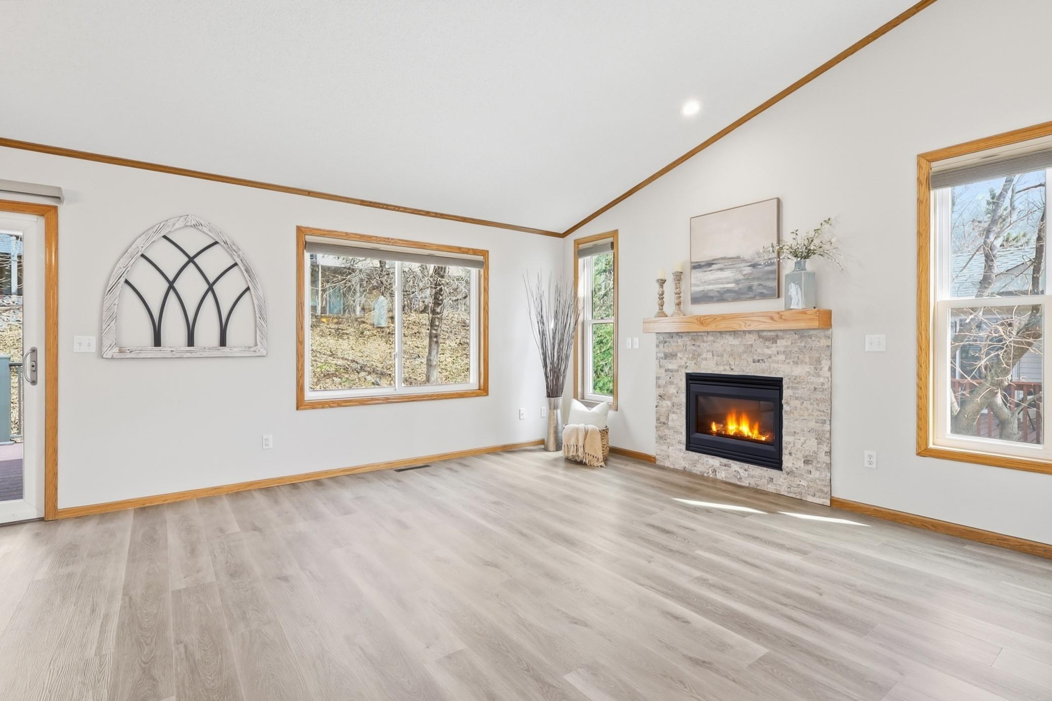 A great room with stone surround fireplace you will love.