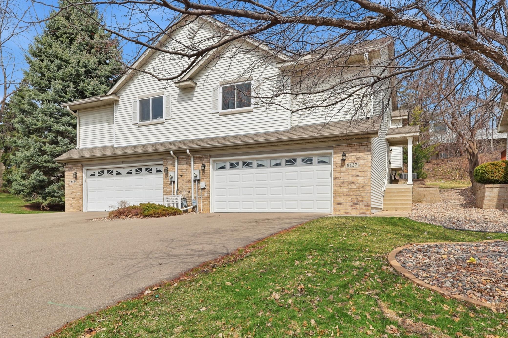 Welcome home to this impressive and updated end unit townhome in Apple Valley.