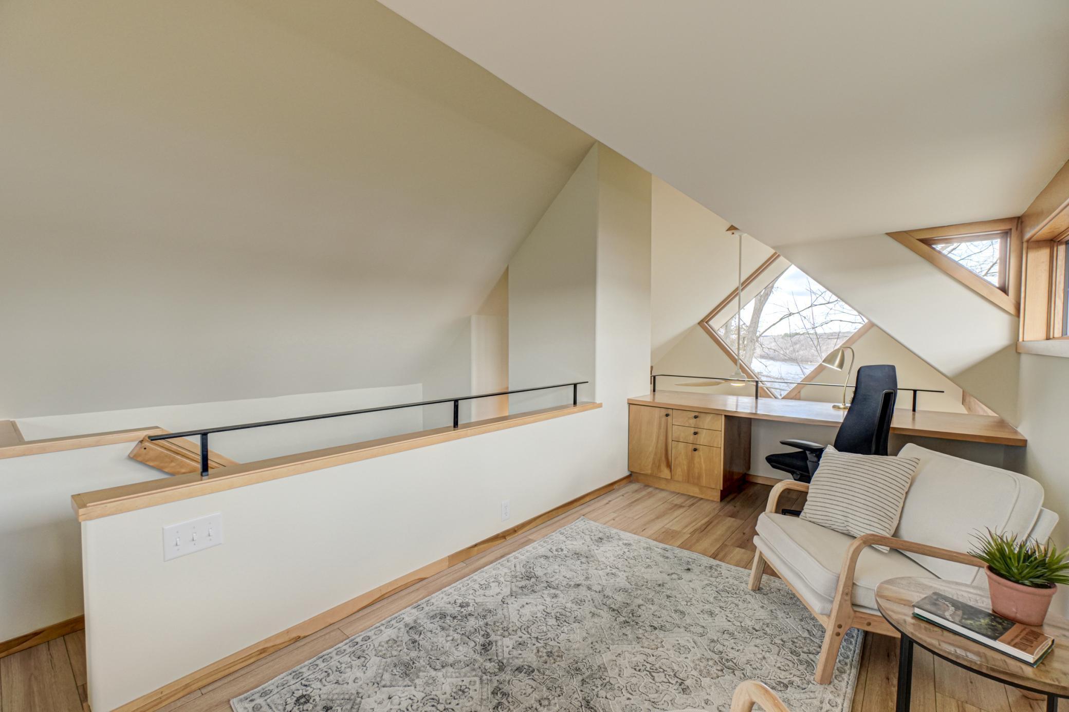 The eagle's nest opens to the primary bedroom