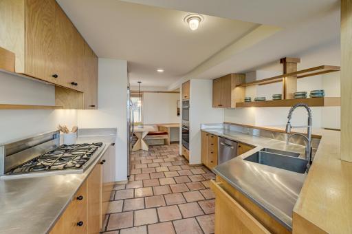 Kitchen has gas stove top and double ovens