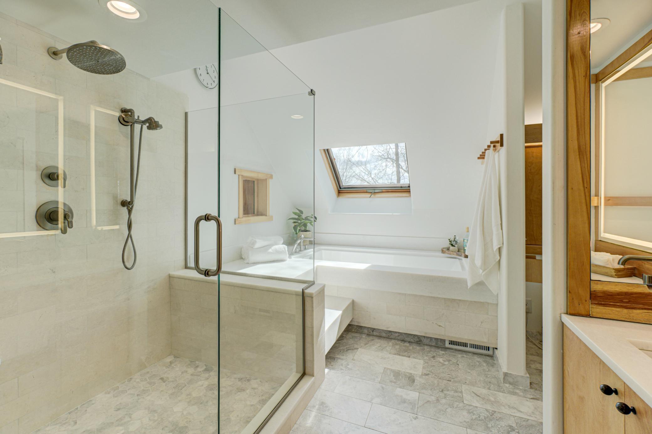 The primary bath provides a spa-like setting