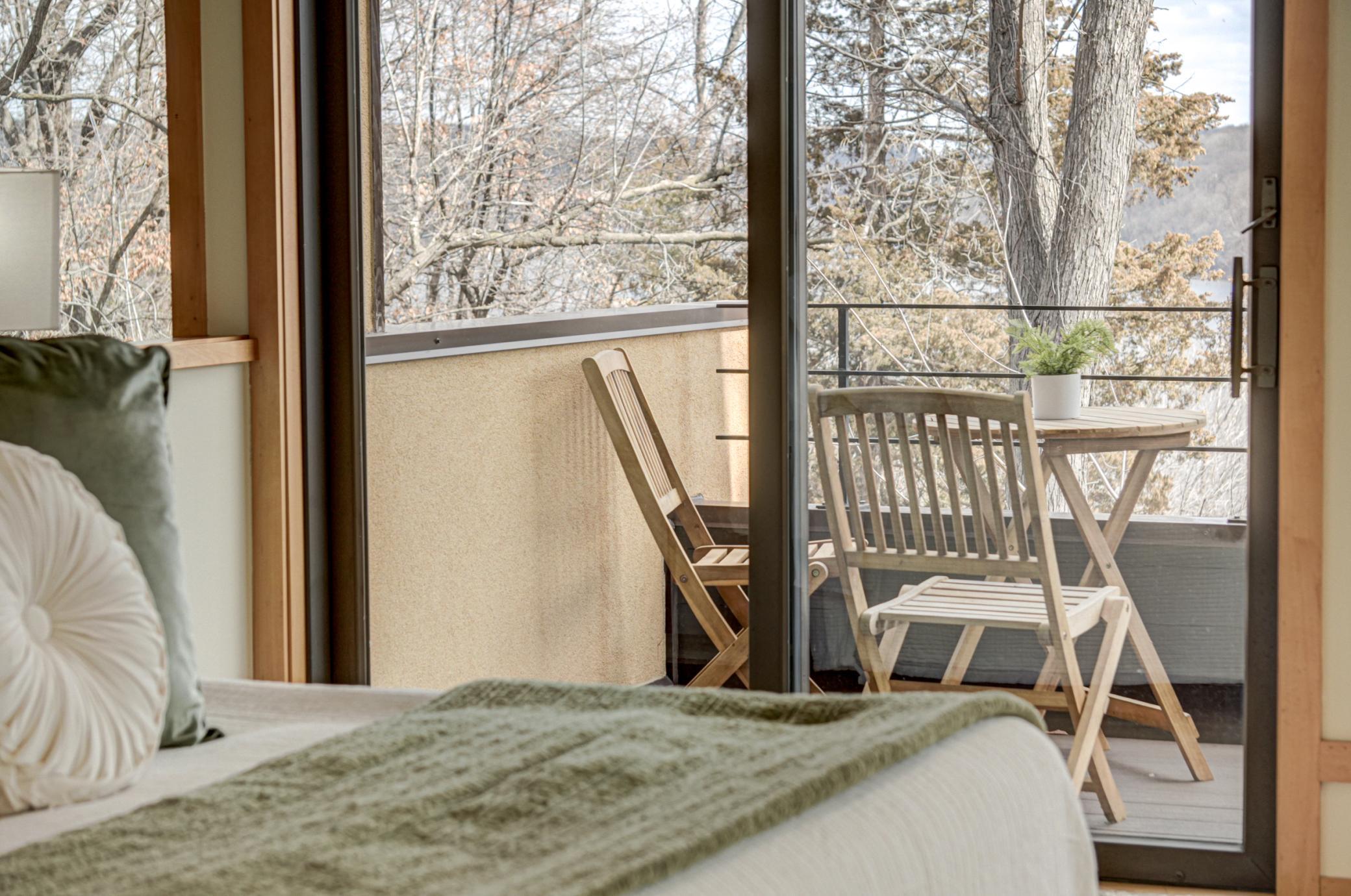 Enjoy morning sunrises from the primary balcony