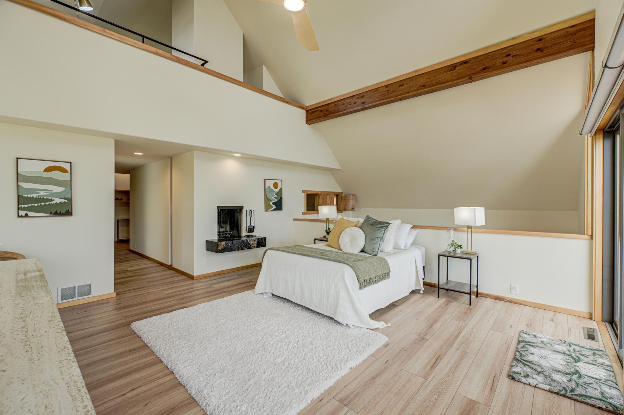 Wood burning fireplace in the primary bedroom