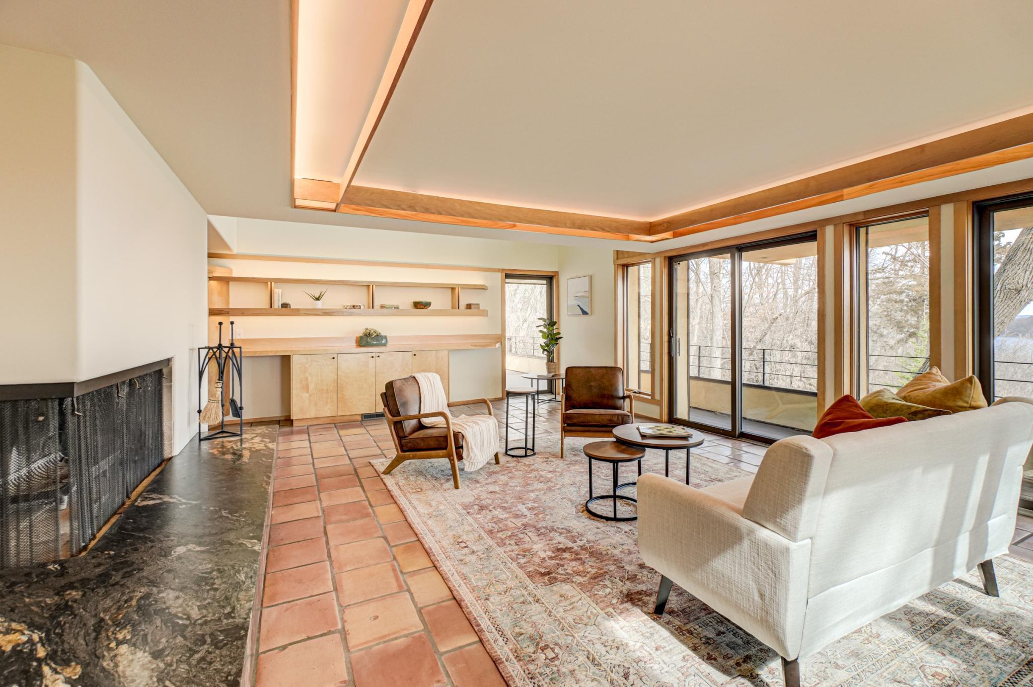 Sliding glass doors in the living give access to deck and stunning views