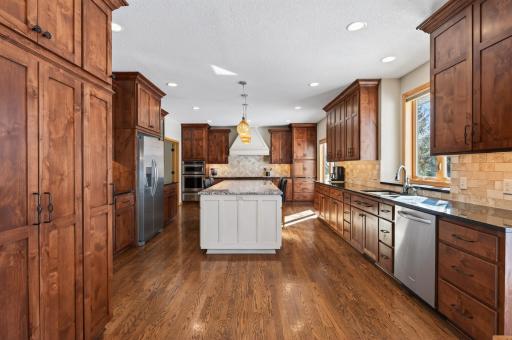 A true gourmet kitchen designed for the culinary enthusiast, thoughtfully appointed with premium upgrades throughout