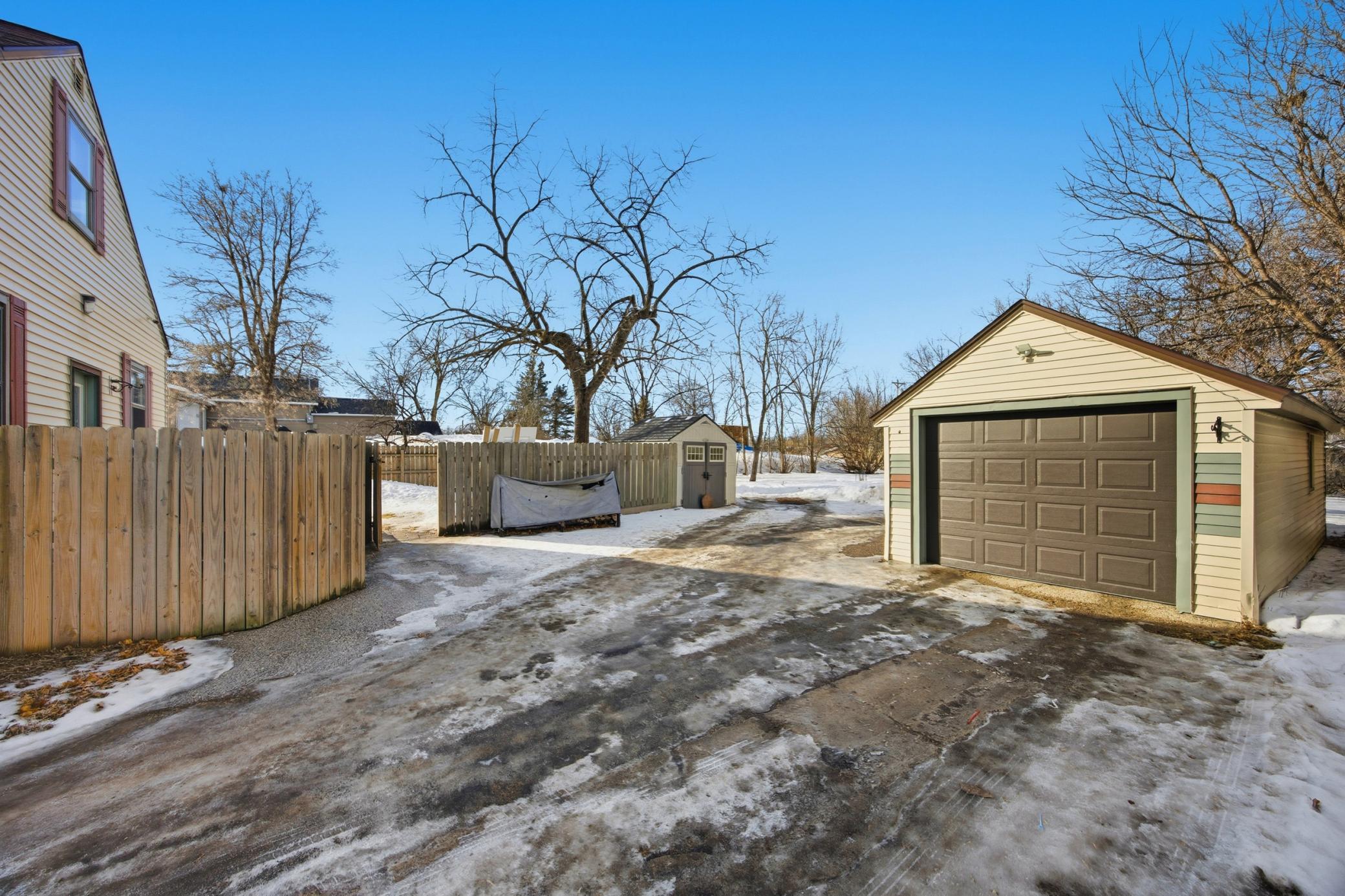 Garage and Driveway with Large Parking area