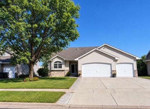 Thereâs a lot to love about this four-bedroom, three-bath home, starting with a backyard that feels wonderfully open thanks to its unique setting alongside the New Prague High School tennis courts.