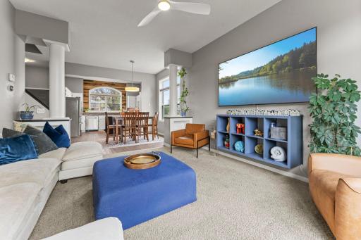 Inside, the main level brings everyone together with an easy connection between the living, dining, and kitchen spaces.