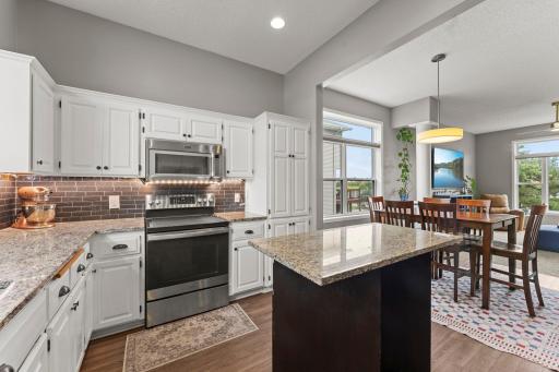 Granite countertops, a center island, under-cabinet lighting, and a new dishwasher.