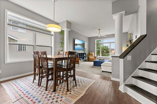 Architectural pillars add a thoughtful touch of detail while defining the connected dining space.