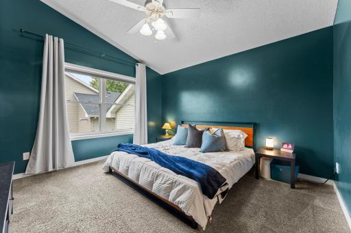 Upstairs, three bedrooms offer comfortable separation from the main living areas.