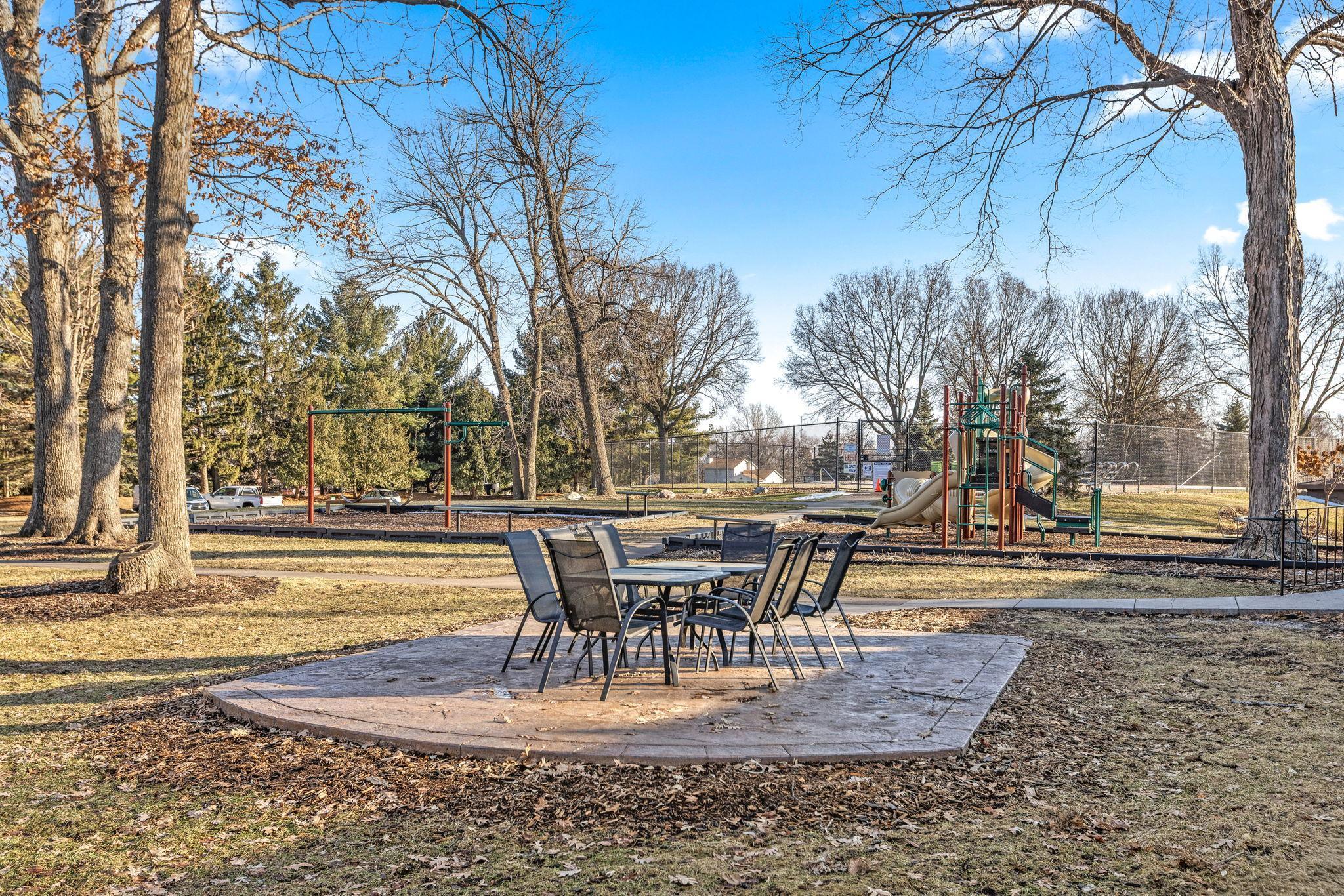 playground and courts - frontside of clubhouse.