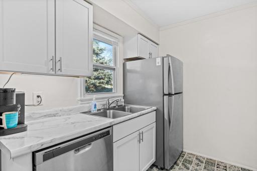 New windows and cupboards elevate the kitchen
