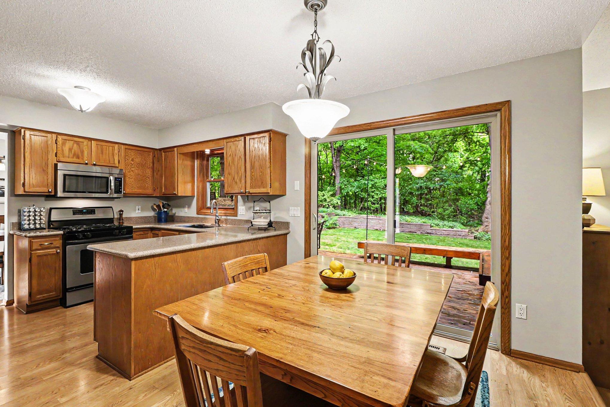 Wonderful eat-in kitchen which walks right out to the oasis in the back