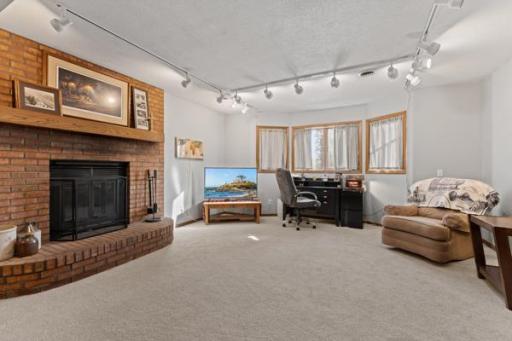Lower Family Room w/ Fireplace could be a 5th Bedroom