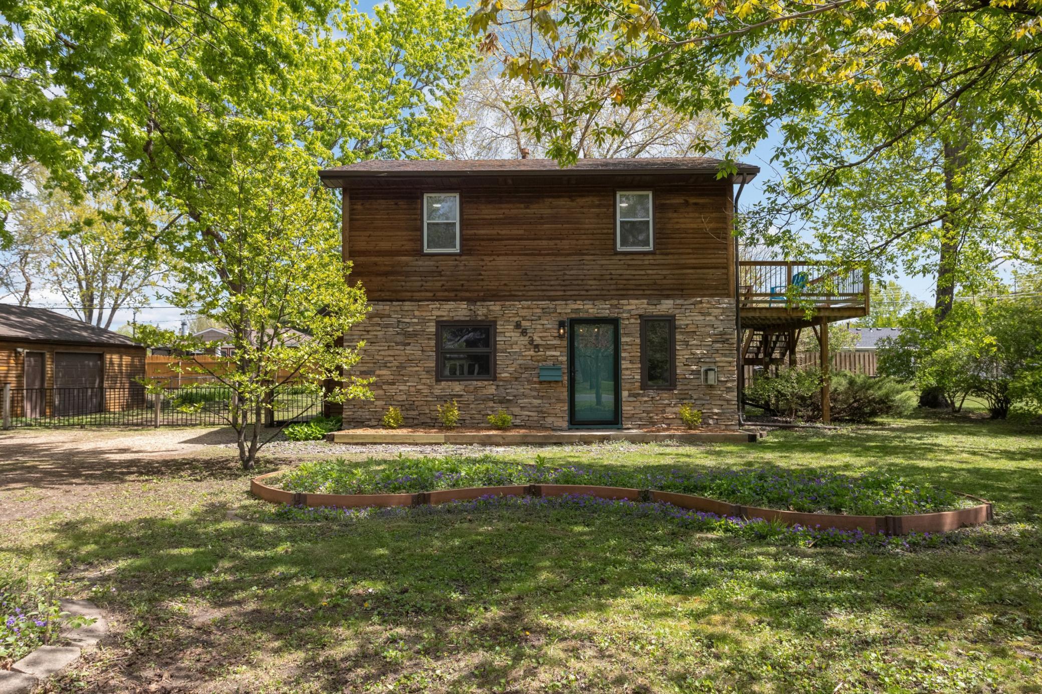 Welcome home to 8635 Oakland Ave S! This oversized lot filled with mature trees and gardens feels like a sanctuary in the middle of the city!
