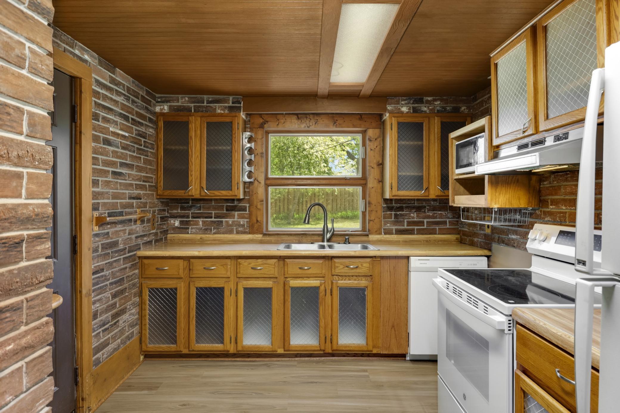 Side entrance/mudroom is the left of the photo