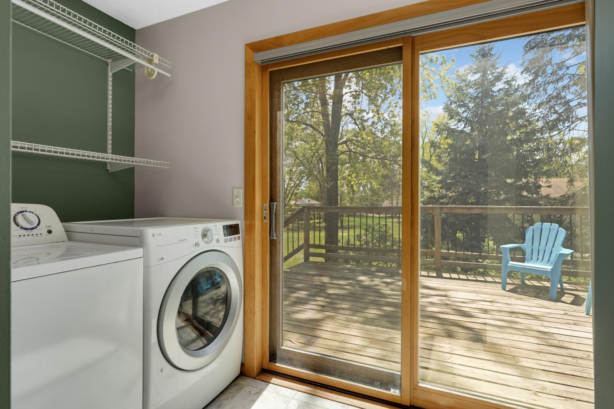 Located just off the primary bedroom, you'll the convenience of the laundry location, and spending summer and fall nights on this beautiful deck!
