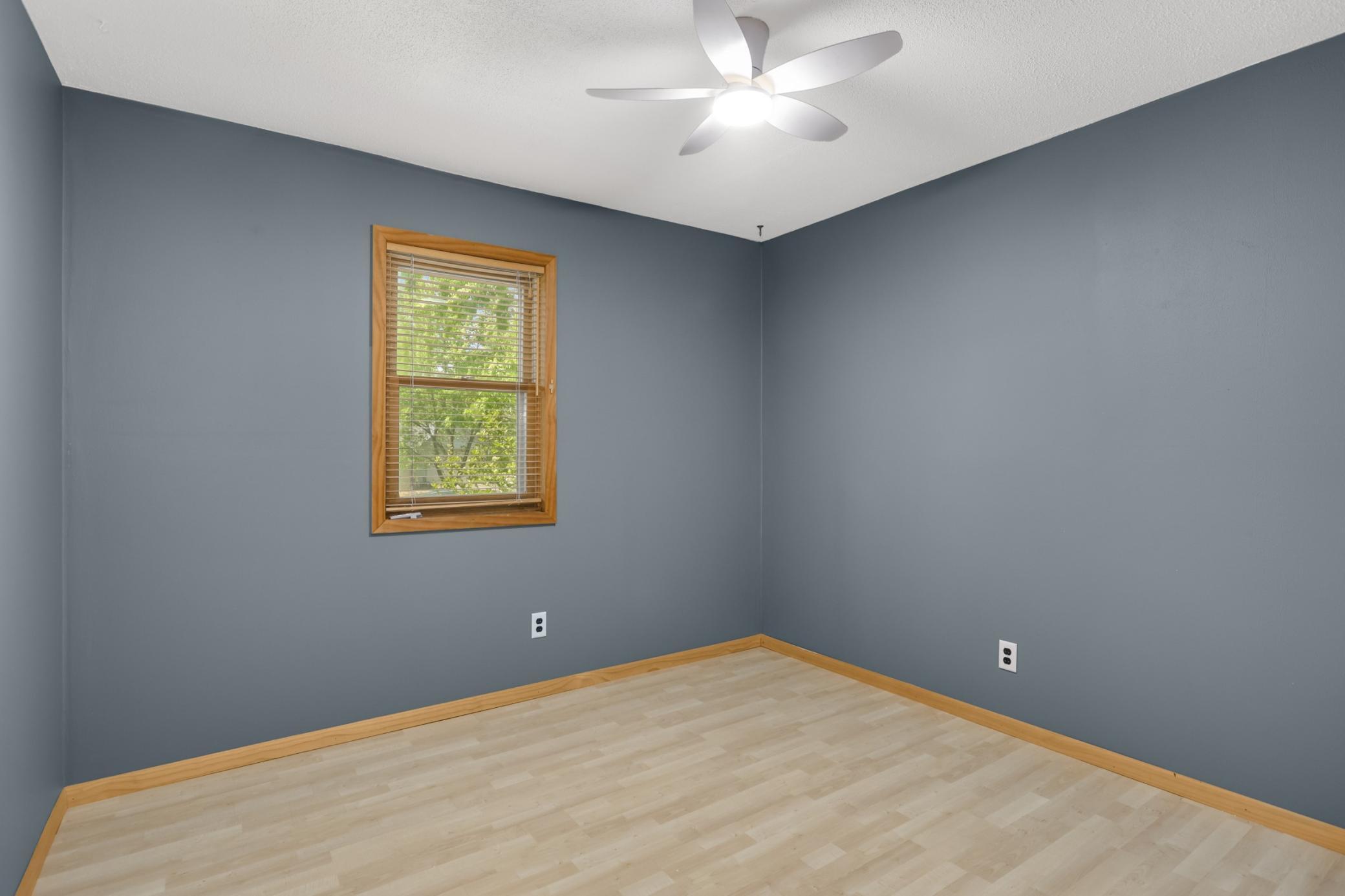 Third upper level bedroom. All bedrooms have ceiling fans