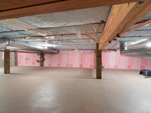 Substantial lower-level storage provides valuable space for seasonal items, recreational equipment, and easy access to home systems.