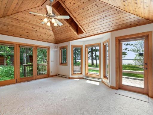 Wake up to panoramic Upper Whitefish Lake views from the comfort and privacy of the main-level primary suite.
