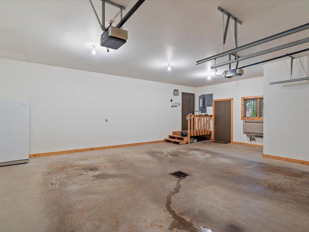 Conveniently connected to the home, the attached garage enhances year-round comfort and accessibility.