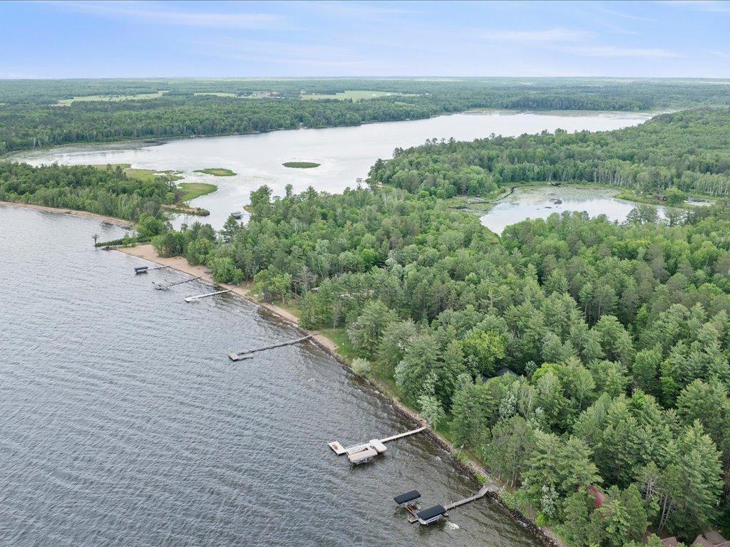 A remarkable location on the Whitefish Chain, where Upper Whitefish Lake meets Arrowhead Lake and nearby Mud Lake, creating a unique setting surrounded by water, wildlife, and protected Northwoods scenery.