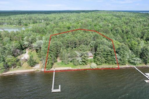 Approximate boundary lines shown for the primary 3.73-acre Upper Whitefish Lake parcel, offering 300 feet of shoreline, mature pines, and exceptional privacy.
