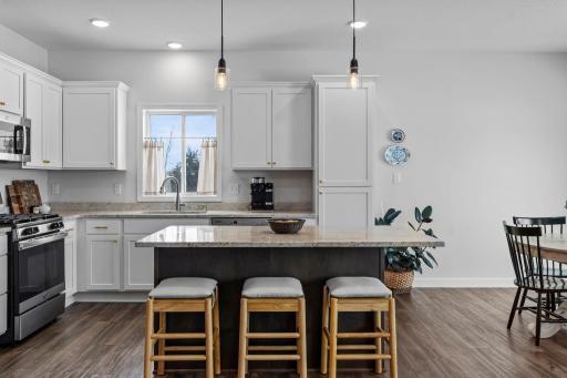 All of the cabinets feature soft closed doors and drawers, and a pull out trash bin.