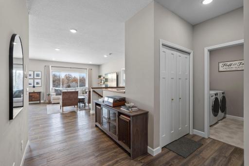 Taking a step back towards the garage entrance, you will find a deep closet to store all of your outdoor gear.