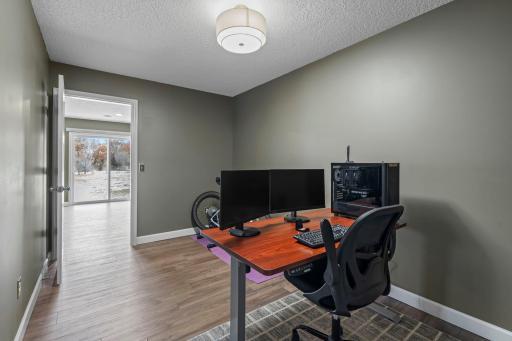 The dedicated work space means you don't have to use one of the four bedrooms as an office, and looks right out to the patio door. This room could also be used as a home gym, toy room, hobby room, you choose!