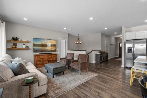 The LVP flooring travels throughout the main level common areas making this space open to many layouts.