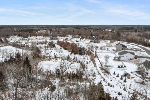 There are walking trails right outside your backyard! They wind throughout the wooded areas of this entire neighborhood and lead you to the association's lake access.