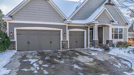 Modern Garage doors with Cement Driveway!